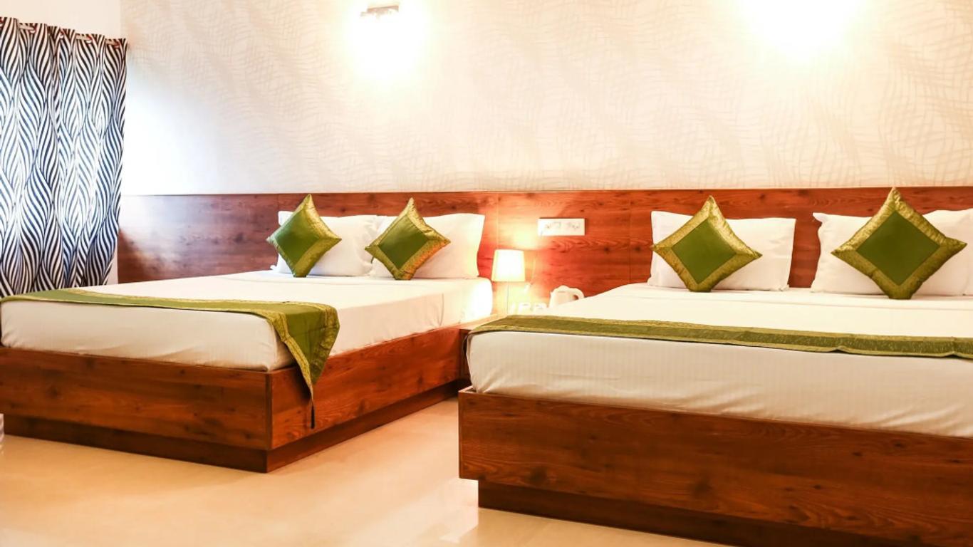 Treebo Comforts Inn, University Road Deralakatte
