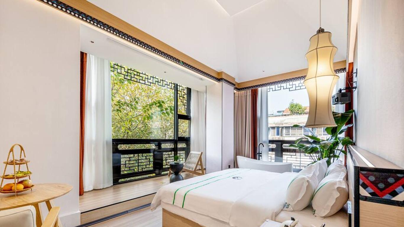 Xishu Garden Inn - Travel Agency service - Car Rent service - English Speaking